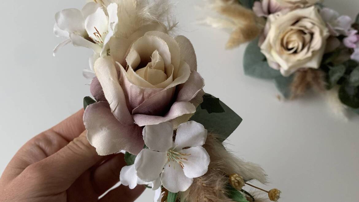 Floral accessories for a wedding occasion in beautiful shades of nude and peach in a charming boho style.