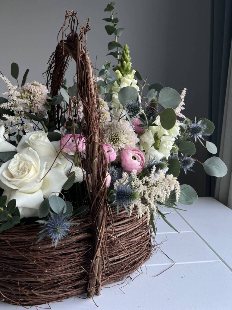 Luxurious basket arrangement that, infused with romantic touches and elegant details.