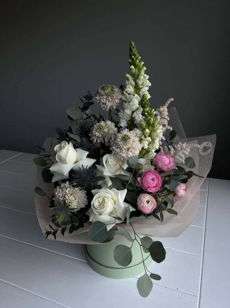 Speechless box filled with an elegant combination of flowers, perfectly crafted to impress.