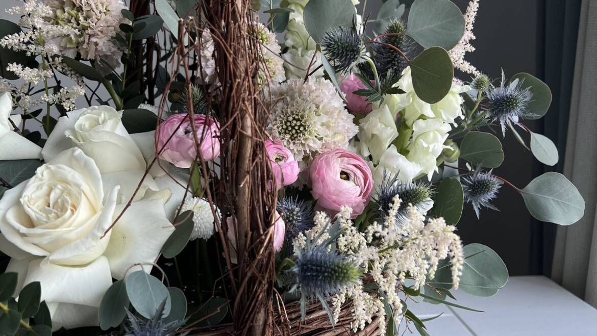 Luxurious basket arrangement that, infused with romantic touches and elegant details.