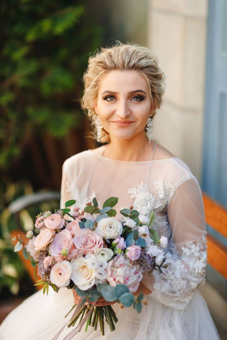 Everlasting dusty pink mix of silk flowers wedding bouquet.
