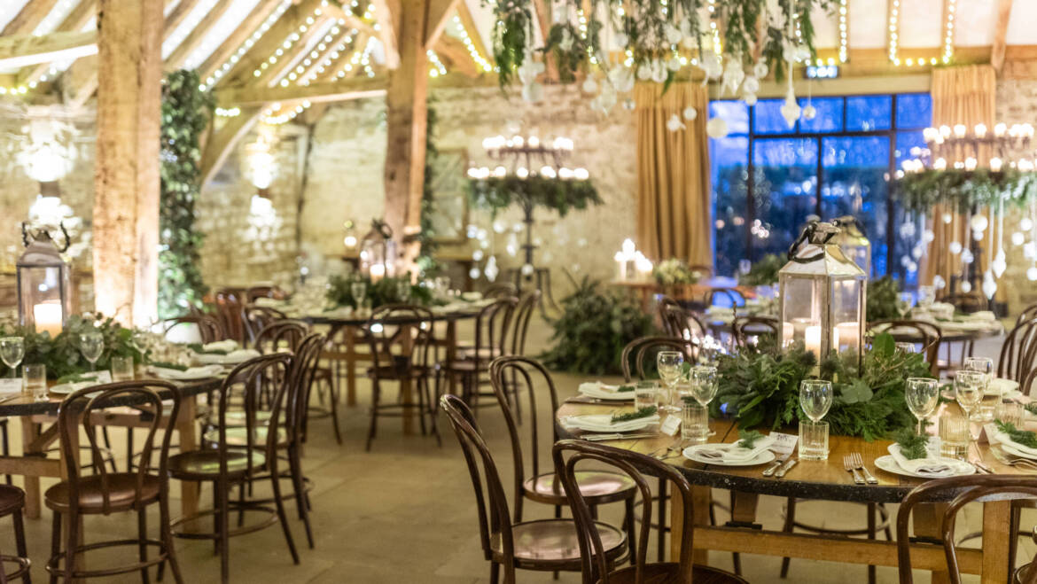 Lush evergreens and delicate thistle-  a romantic winter wedding, with sparkling white baubles, gently kissed by the warm glow of candles.