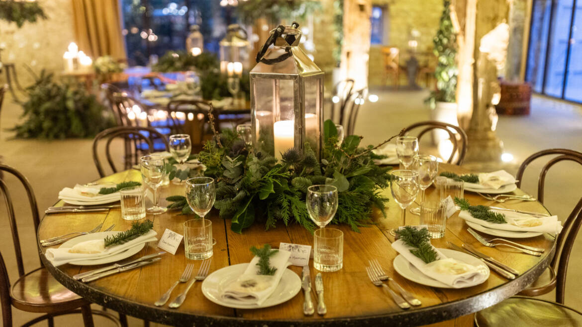 Lush evergreens and delicate thistle-  a romantic winter wedding, with sparkling white baubles, gently kissed by the warm glow of candles.