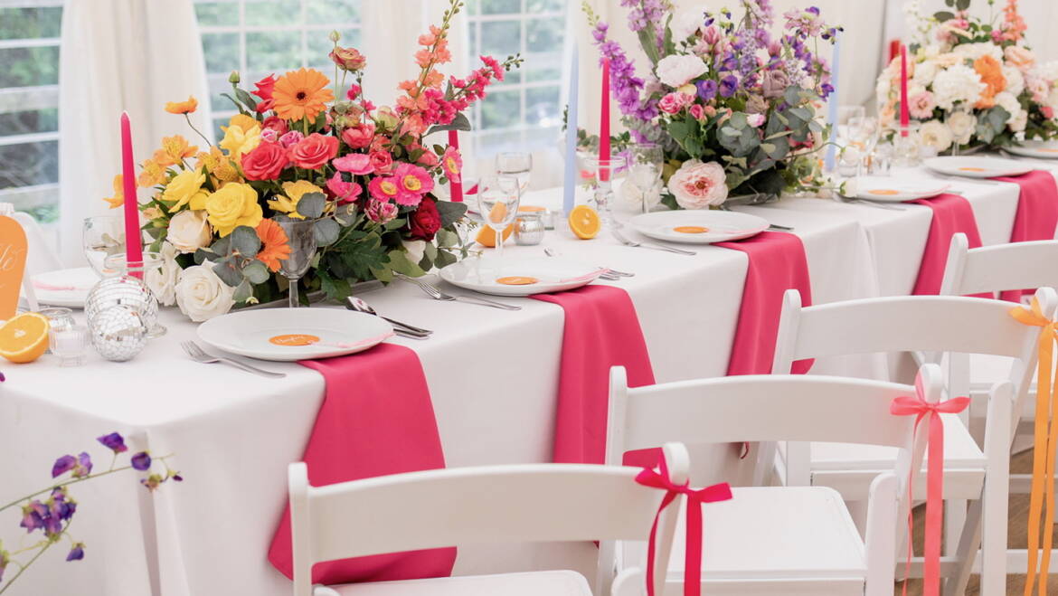 Bright summer flowers for a  garden-style wedding, bursting with vivid colors and lush greenery, creating a cheerful, lively, and sunlit floral atmosphere