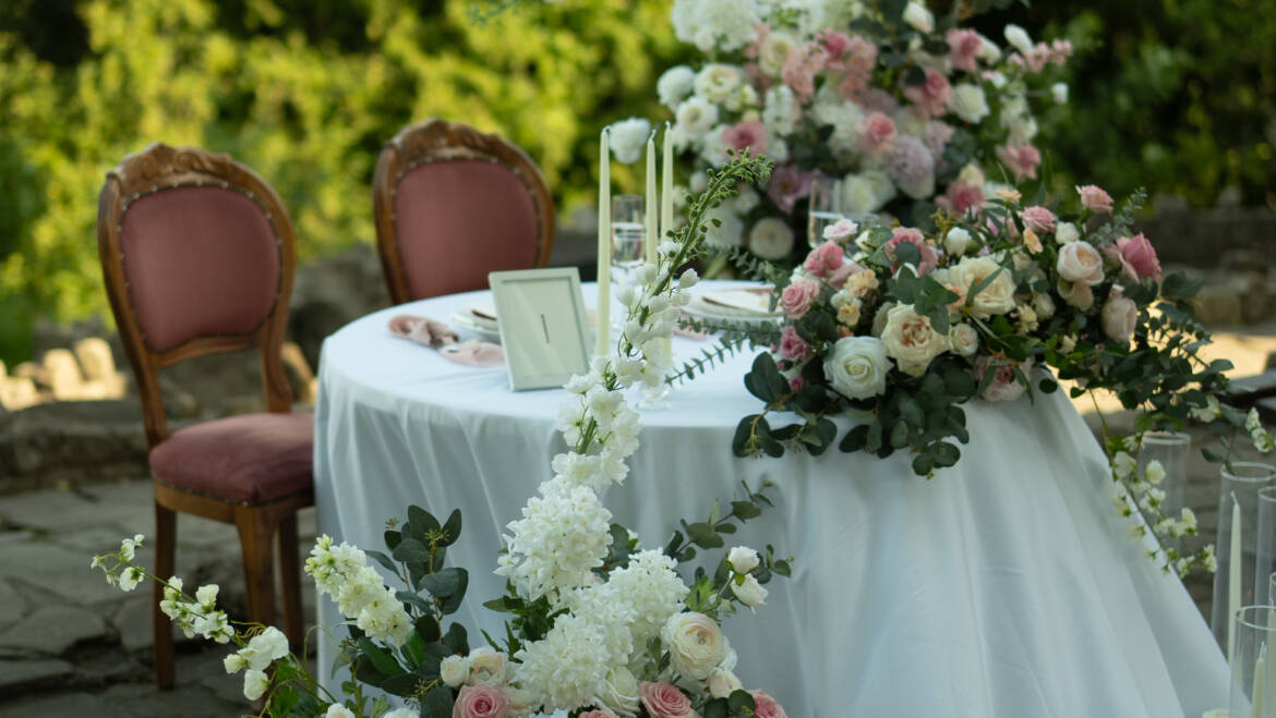 Symphony of white and pink blooms transforming the historical venue into a flower haven