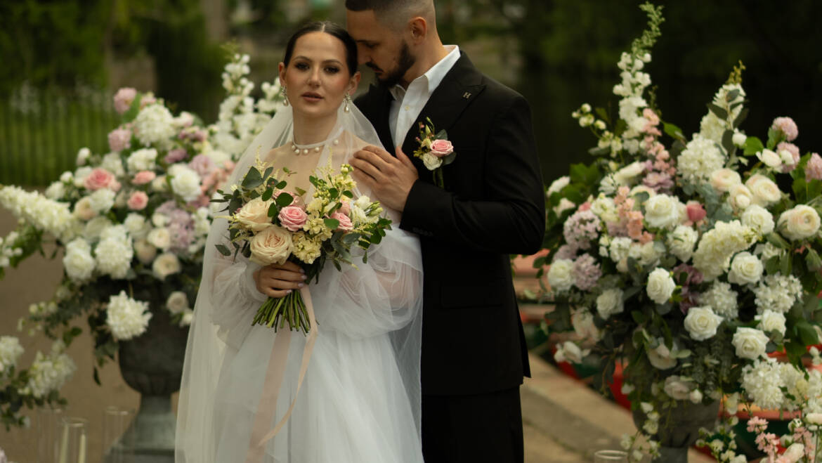 Symphony of white and pink blooms transforming the historical venue into a flower haven
