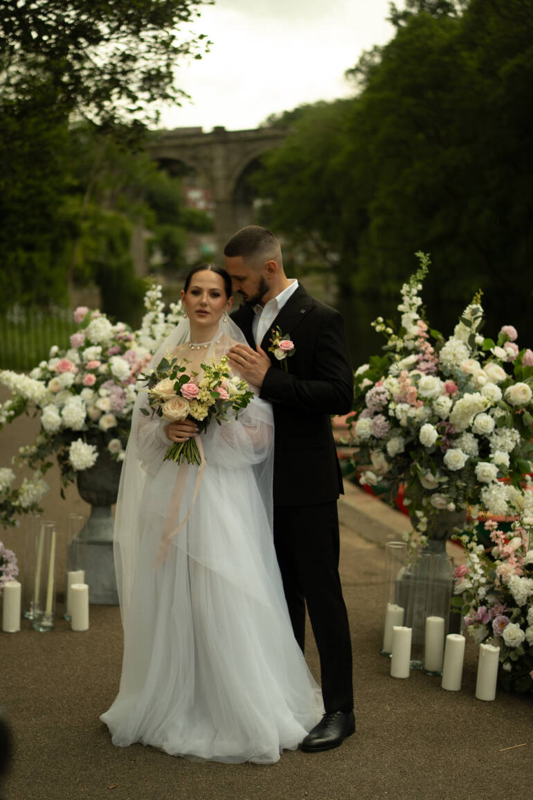 Symphony of white and pink blooms transforming the historical venue into a flower haven