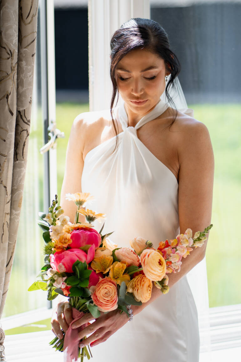 Bright, playful blooms in a bridal bouquet, creating a lively, colorful, and irresistibly fresh summer statement.