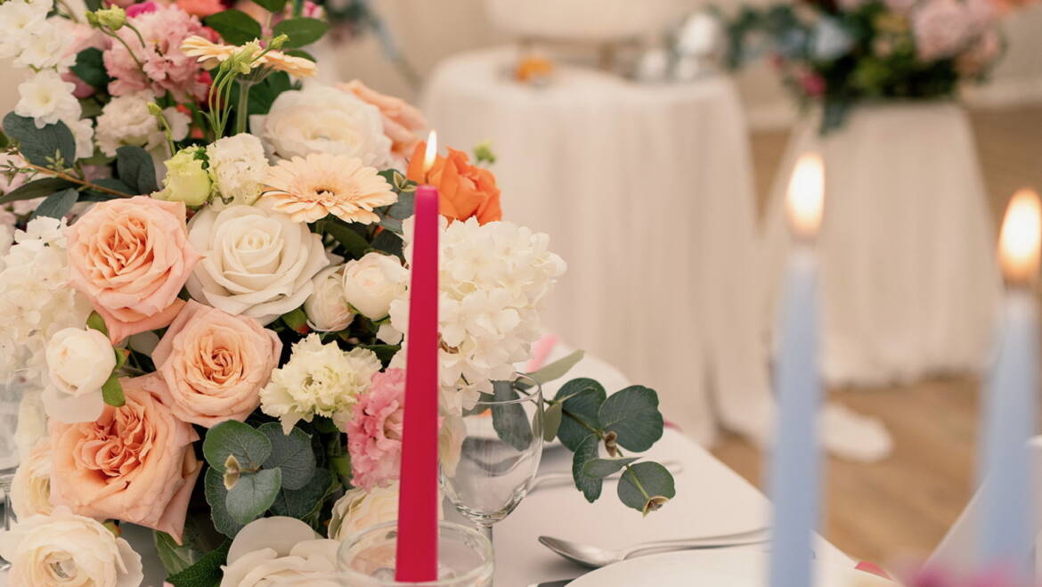 Bright summer flowers for a garden-style wedding, bursting with vivid colors and lush greenery, creating a cheerful, lively, and sunlit floral atmosphere