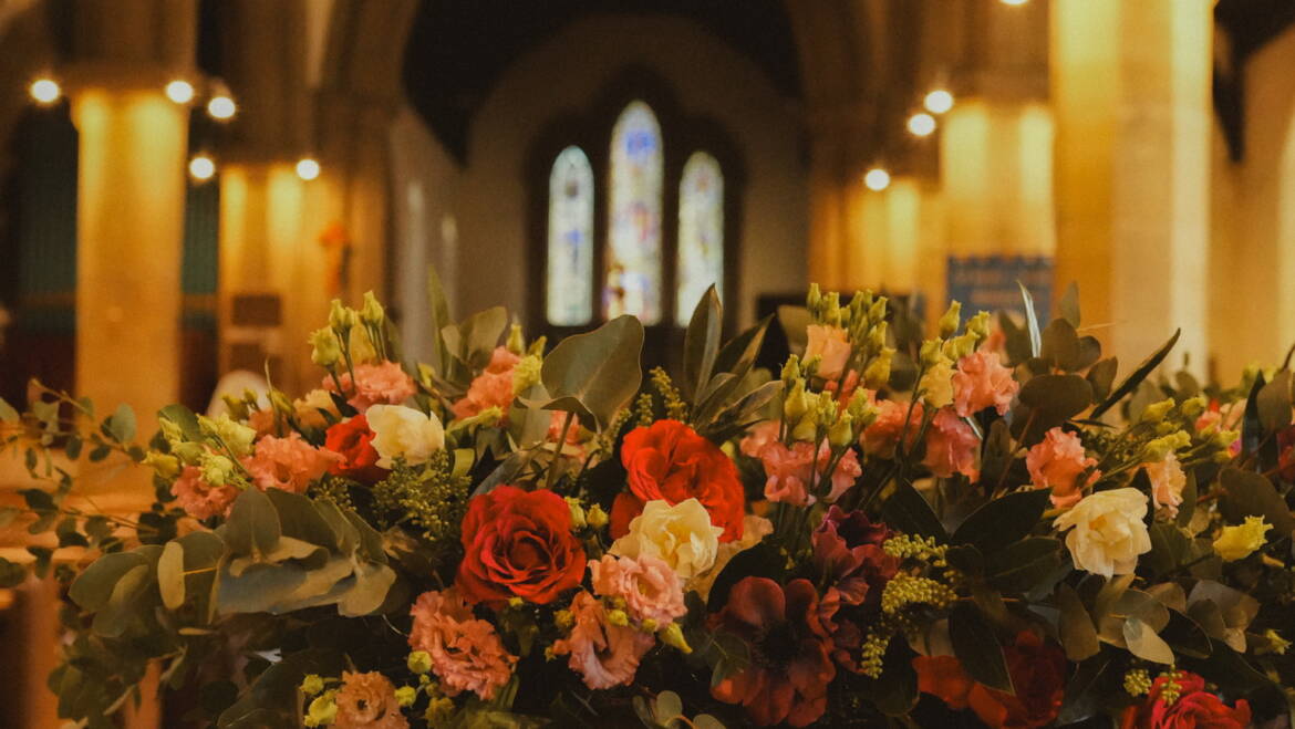 Fairytale-inspired ceremony with lush blooms and flowing greenery, creating a magical, romantic setting for “I do”