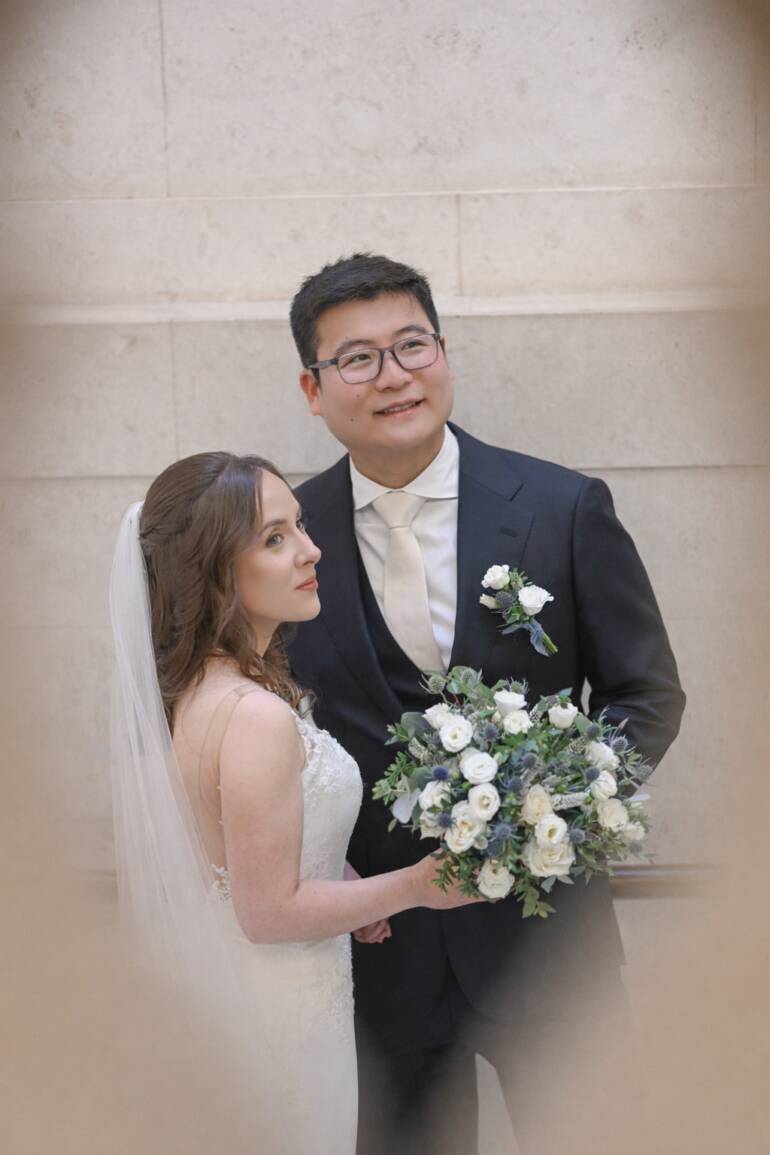 Bridal flowers in pure white blooms accented with delicate Scottish blue thistle, creating an elegant, refined, and subtly textured bouquet with a touch of soft, natural charm.